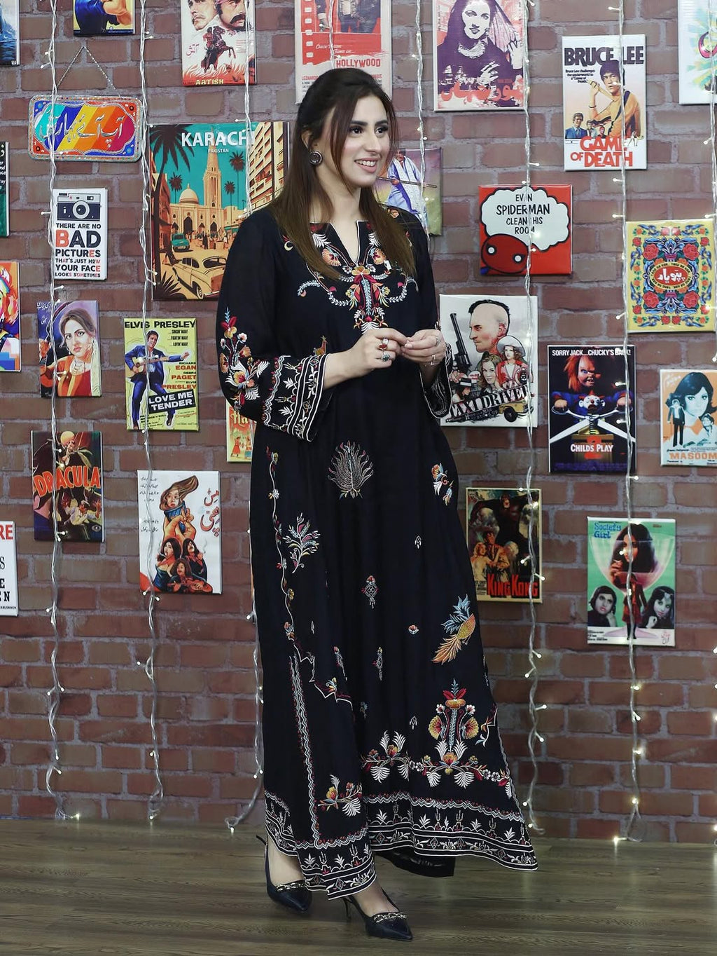 Multi Black Embroidered Cotton 2-piece shirt and trouser set on a hanger